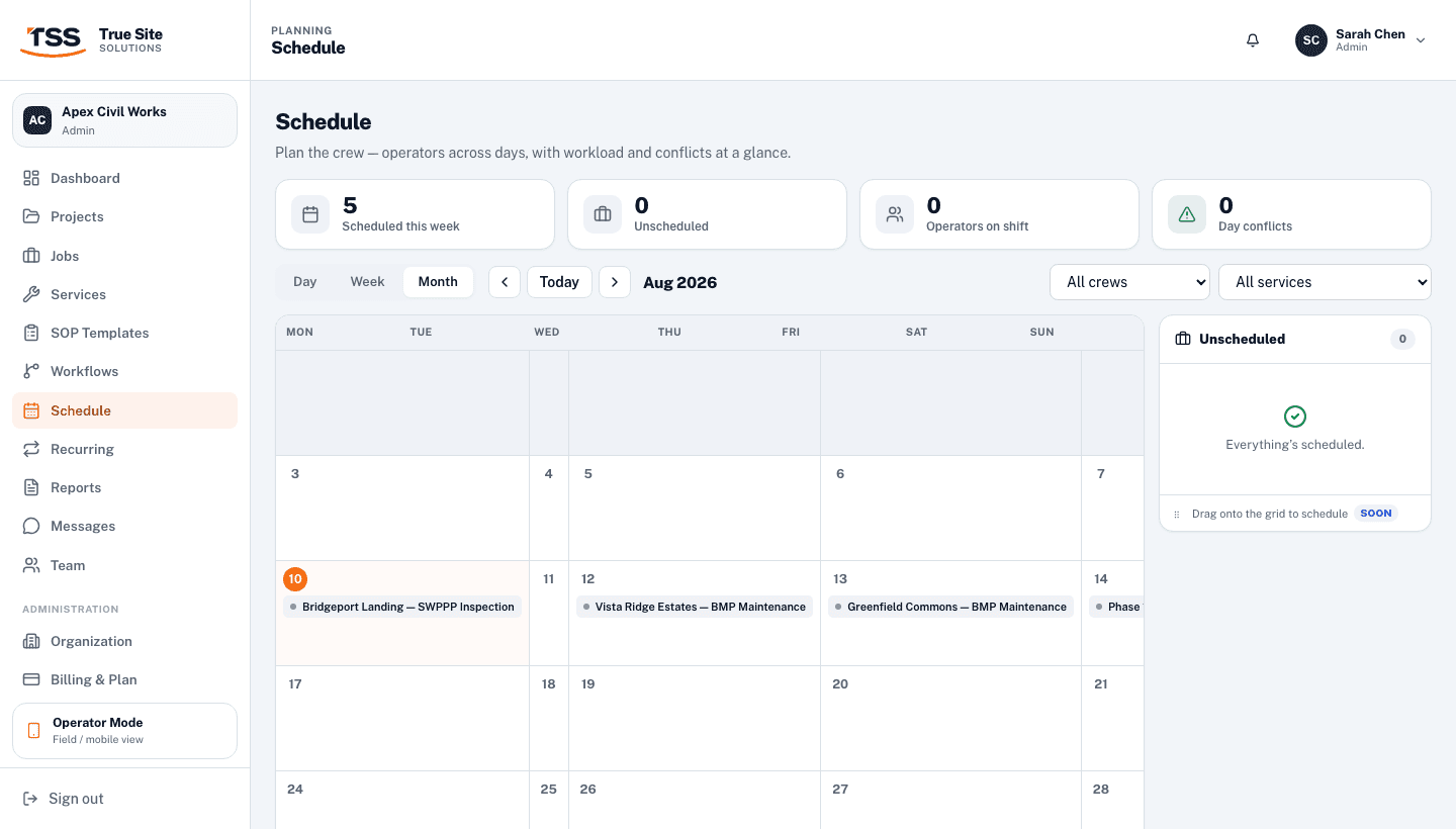 Schedule board in month view showing a full calendar grid with job chips on scheduled dates